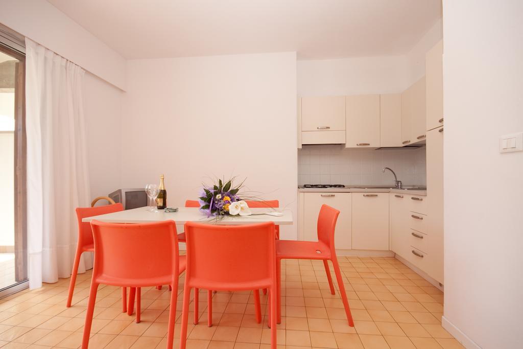 Residence Selenis Caorle Rom bilde