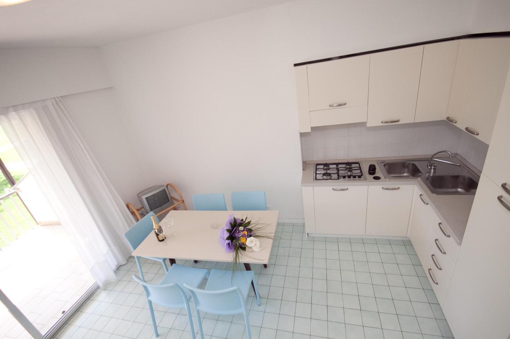 Residence Selenis Caorle Rom bilde