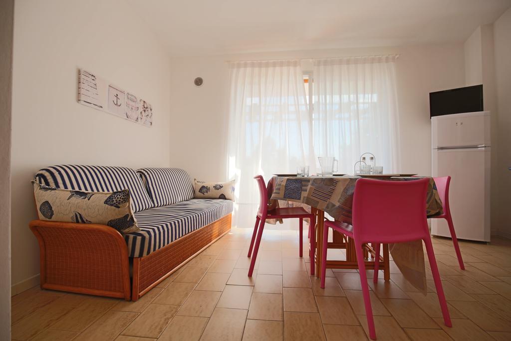 Residence Selenis Caorle Rom bilde